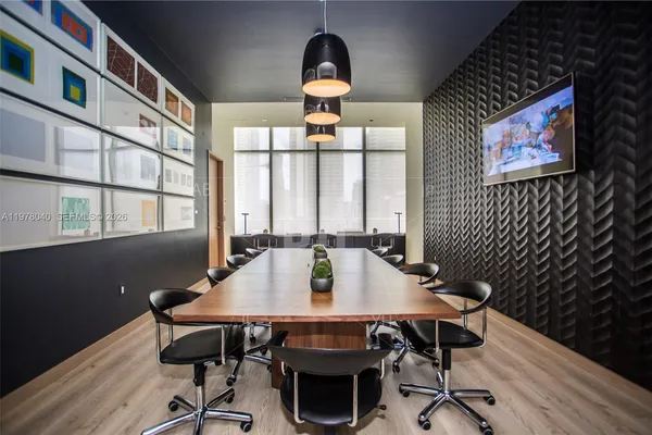 a bathroom with a shower and a sink