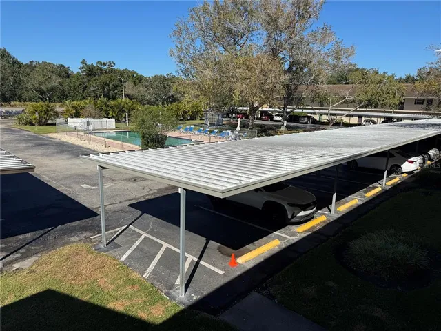 a view of a swimming pool with a terrace