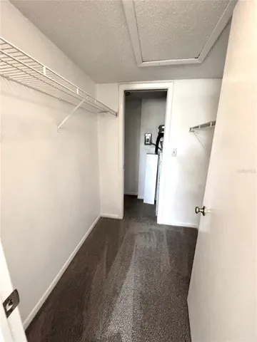 a view of a room with a staircase