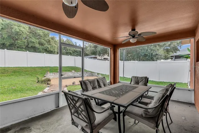 a view of an outdoor dining space with furniture
