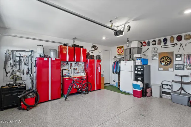 a swimming pool with outdoor seating and yard