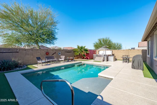 a view of a backyard with a patio