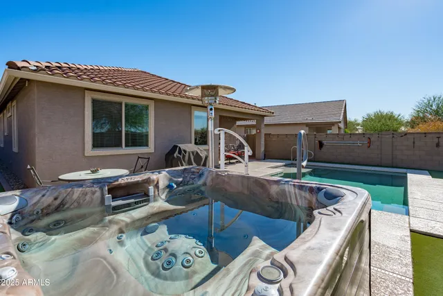 a view of an entrance to house with yard