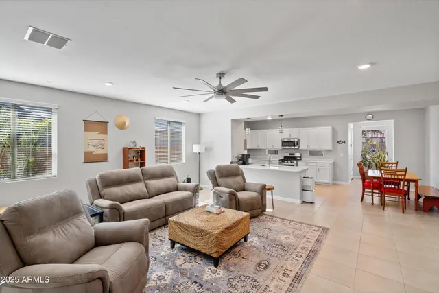 a living room with furniture or couch and a window