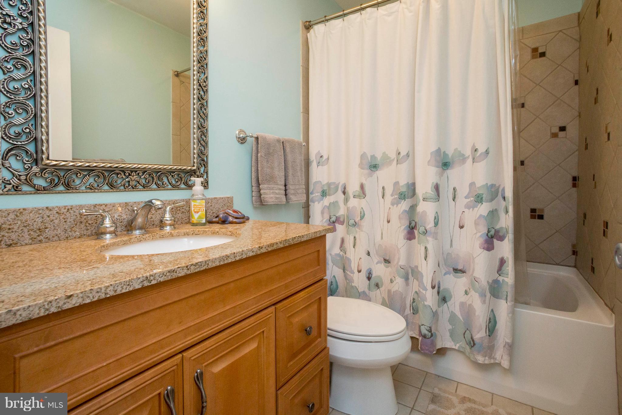 412 Dembytown Road Joppa, MD 21085 - Photo 12 of 23 Hall bathroom was updated with ceramic tilework.