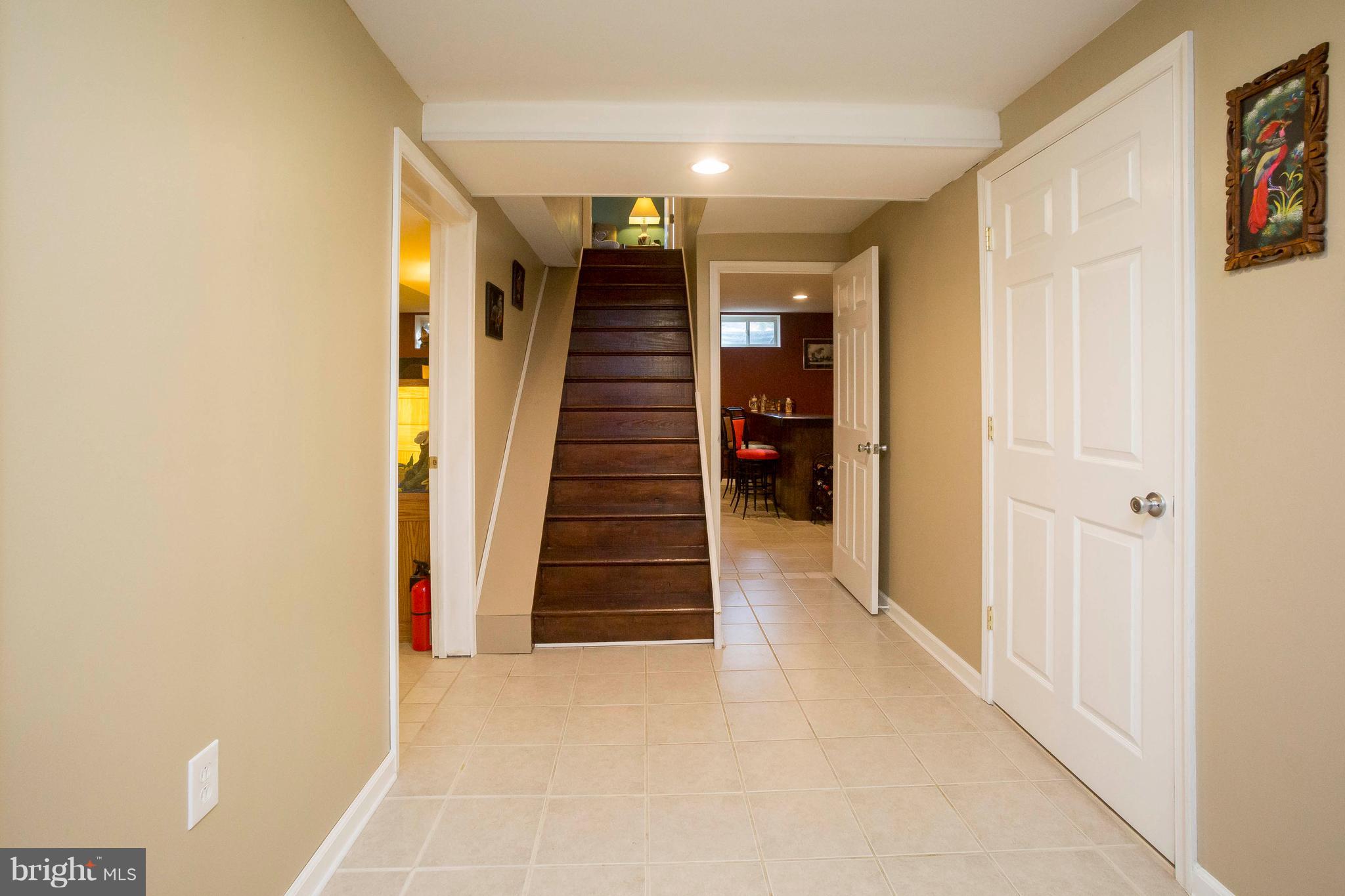 412 Dembytown Road Joppa, MD 21085 - Photo 18 of 23 The bsmt has a rec room, FB, laundry & storage.