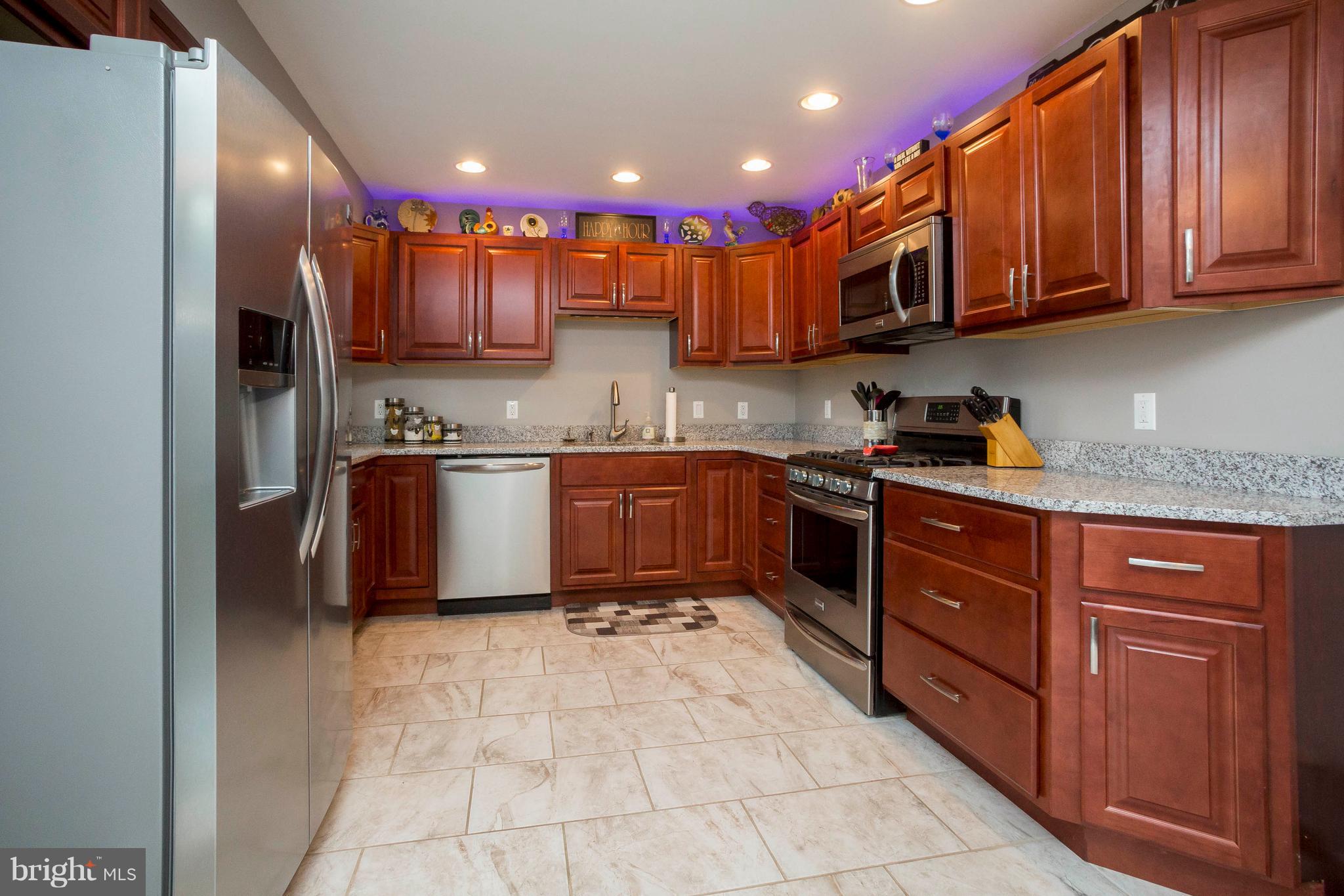 412 Dembytown Road Joppa, MD 21085 - Photo 8 of 23 Updated cabinets, appliances and granite counters.