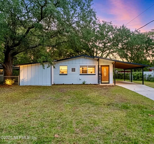 a house view with a garden space