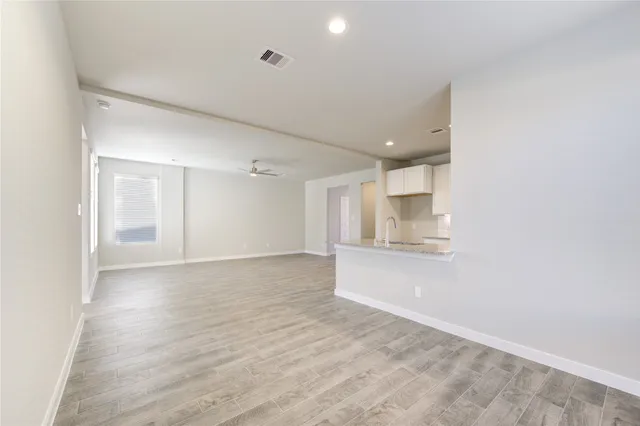 a view of an empty room and window