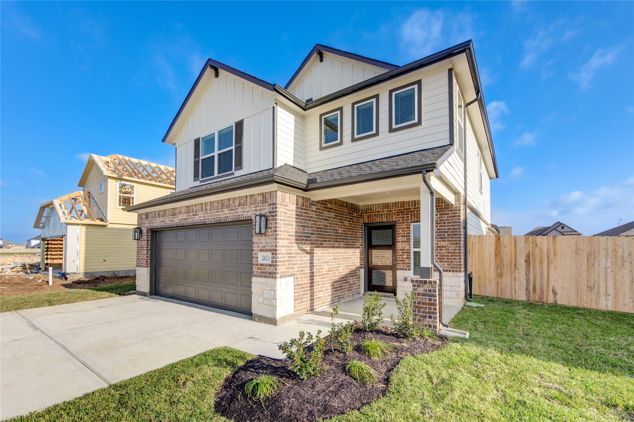 2623 Finley Lane Rosenberg, TX 77471 - Photo 2 of 49 a front view of a house with a yard and garage