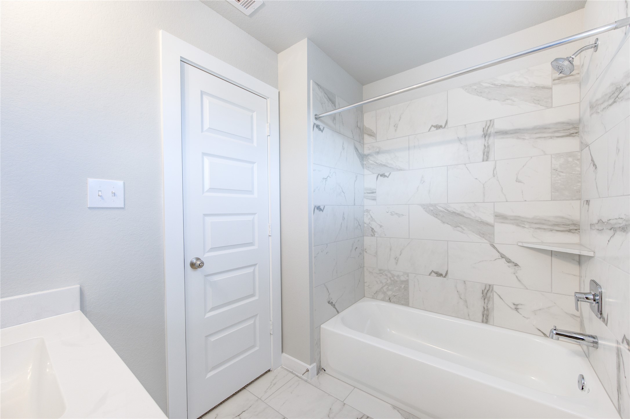 2623 Finley Lane Rosenberg, TX 77471 - Photo 34 of 49 a bathroom with a bathtub and a shower