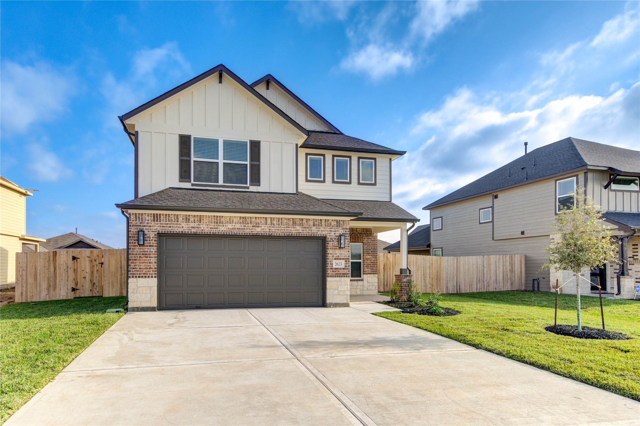2623 Finley Lane Rosenberg, TX 77471 - Photo 4 of 49 a front view of a house with a yard and garage
