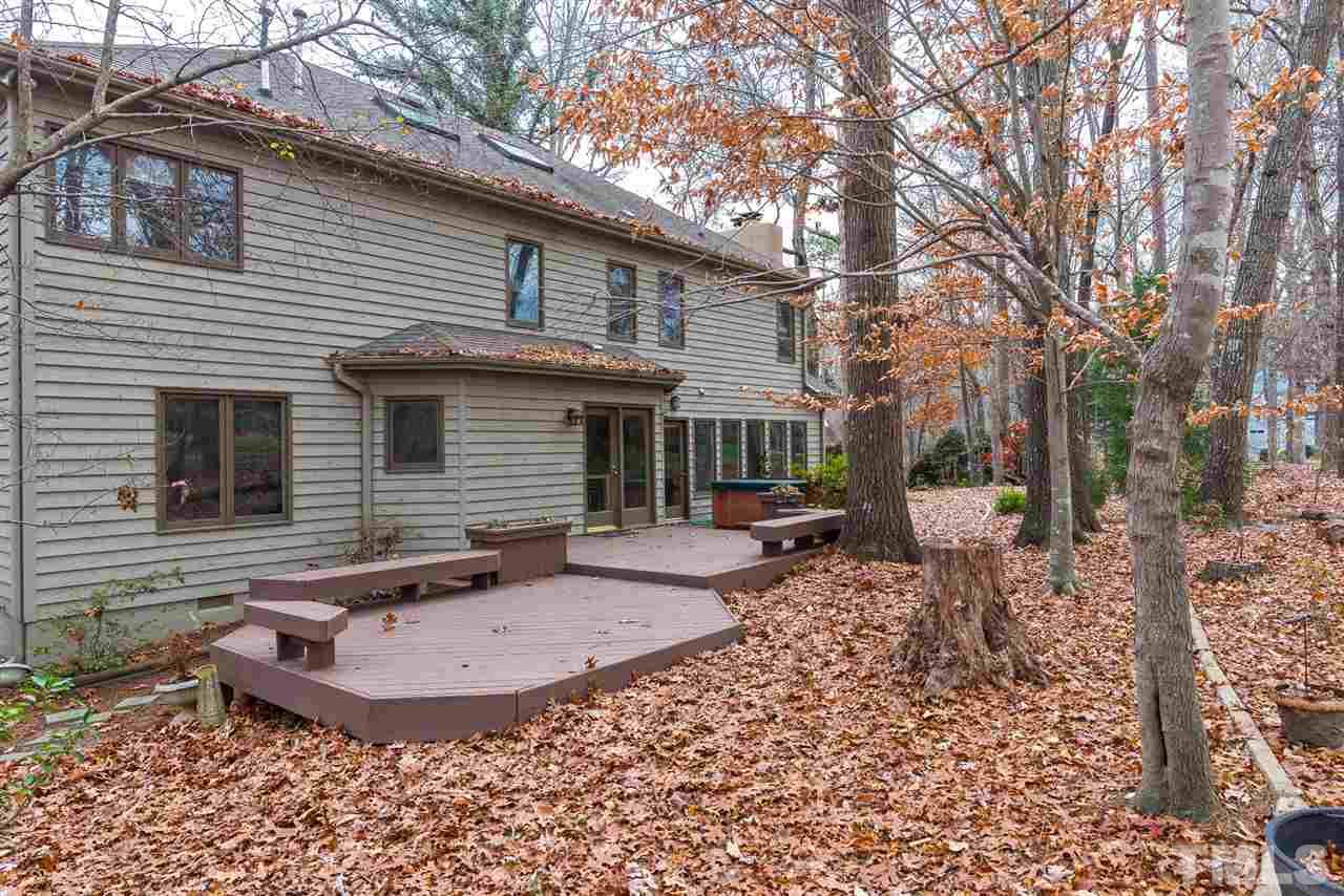 8816 Ross Court Raleigh, NC 27613 - Photo 23 of 25 a view of a house with backyard and chairs