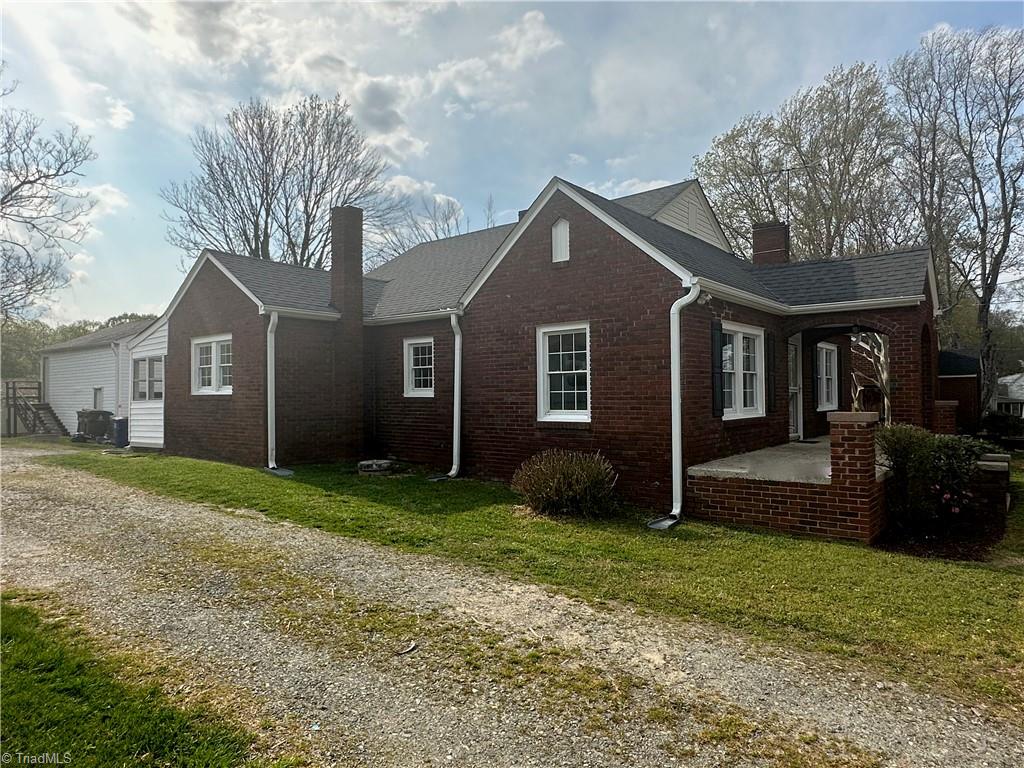 Exterior rear view leading to garage