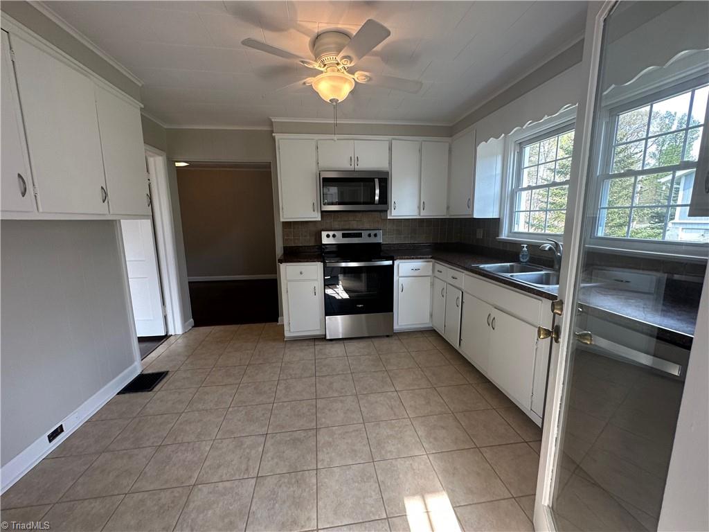 5418 Old Rural Hall Road Winston-Salem, NC 27105 - Photo 10 of 36 Kitchen with tiled floor and plenty of cabinet space