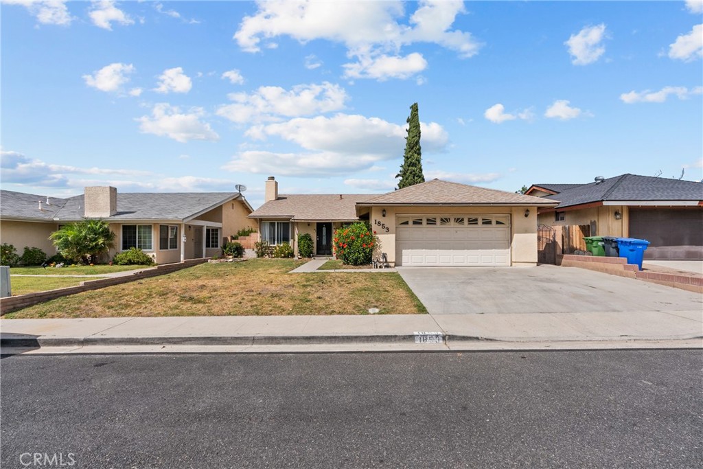 1853 Hillary Court Simi Valley, CA 93065 - Photo 1 of 1 a front view of a house with a garden