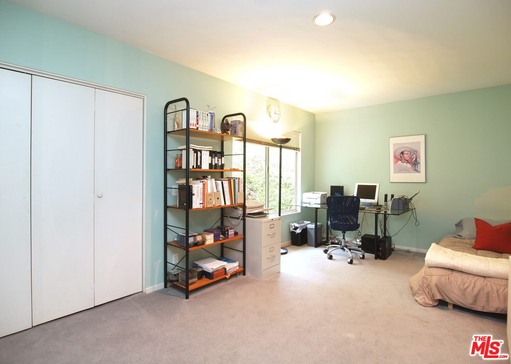 507 West Rustic Road Santa Monica, CA 90402 - Photo 12 of 32 a view of a livingroom with workspace and a window