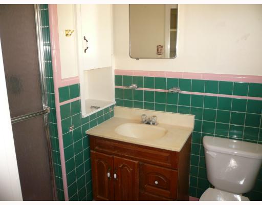 625 Chamberlain Street Corpus Christi, TX 78404 - Photo 8 of 10 a bathroom with a sink a toilet and shower