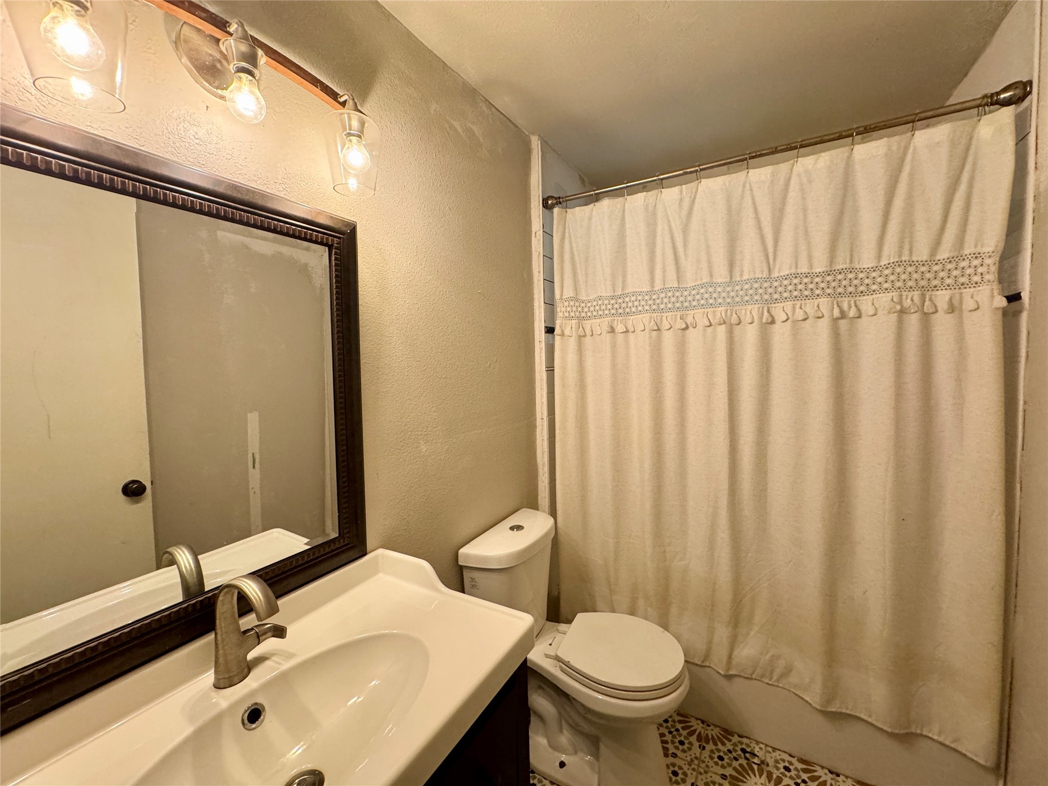 1380 Cardinal Lane Trinity, TX 75862 - Photo 17 of 28 Vanity, light fixture and flooring have been replaced!