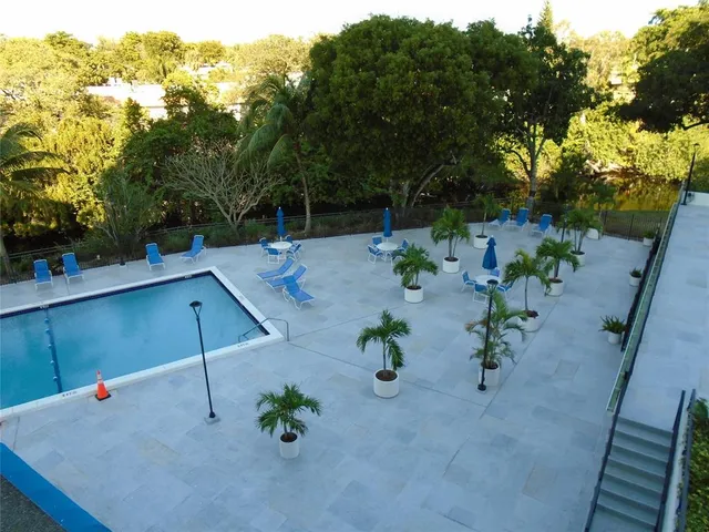 a bathroom with a bathtub and a window