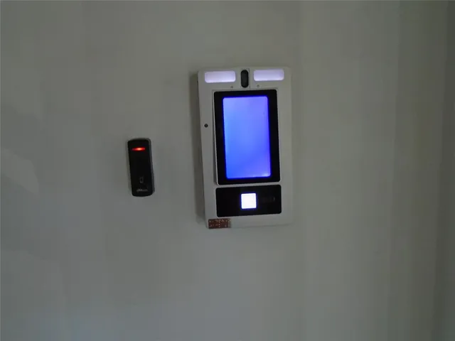 a lobby with furniture and a chandelier