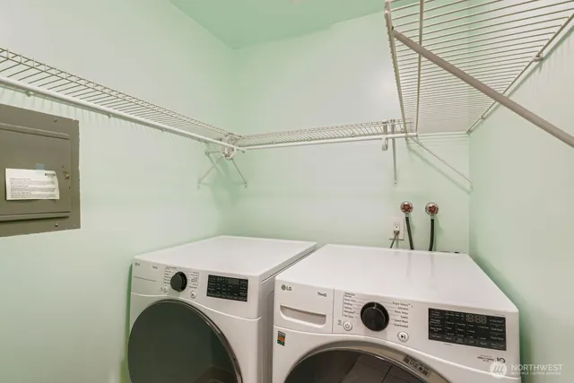 a utility room with dryer and washer