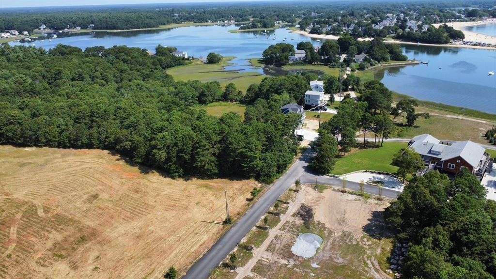 10 Over Jordan Road Wareham, MA 02571 - Photo 2 of 10 an aerial view of a house with yard and lake view in back