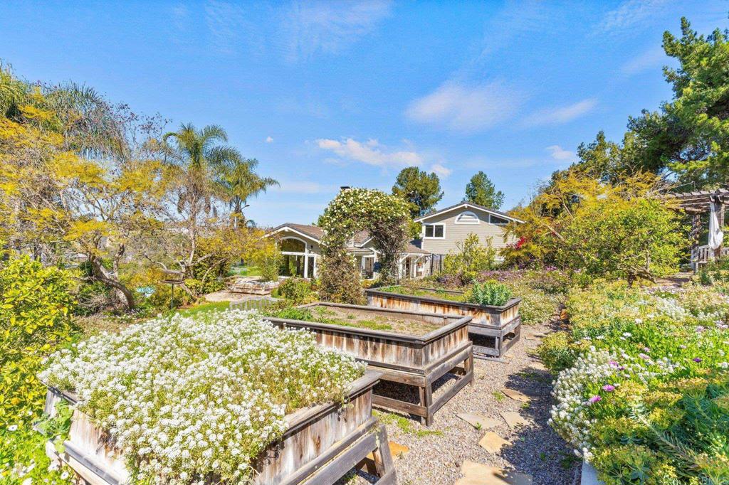 3355 Lone Jack Road Encinitas, CA 92024 - Photo 18 of 54 a balcony with table and chairs and potted plants