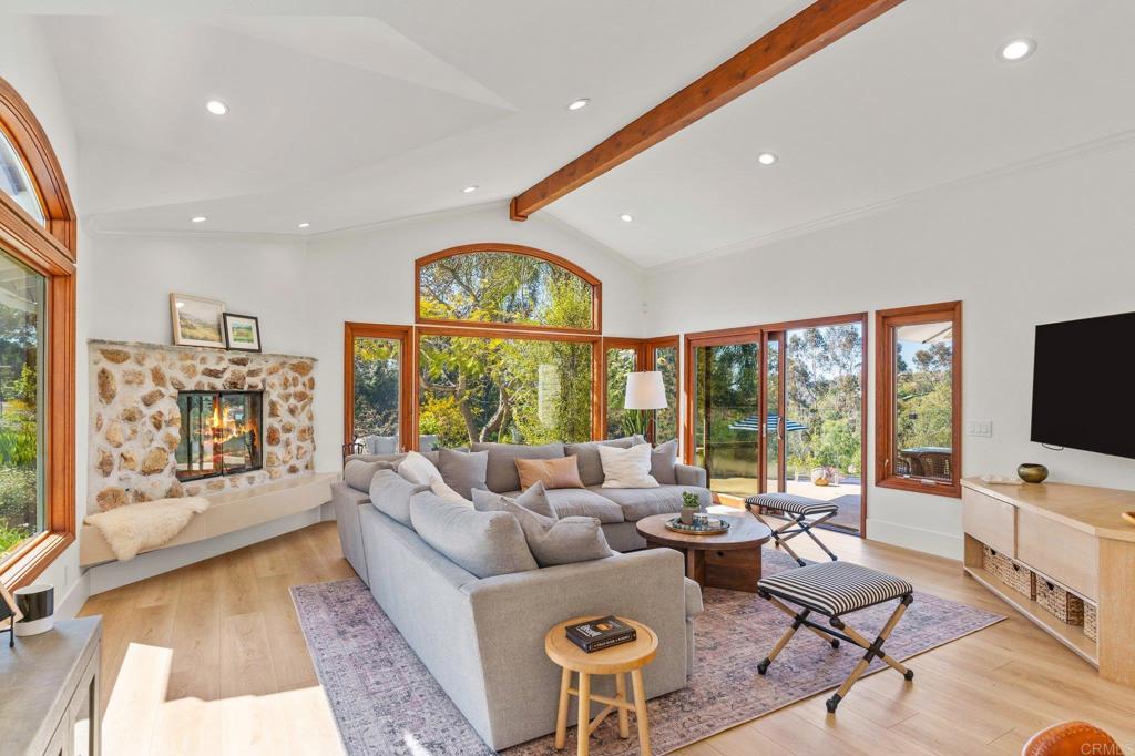 3355 Lone Jack Road Encinitas, CA 92024 - Photo 24 of 54 a living room with furniture and a flat screen tv