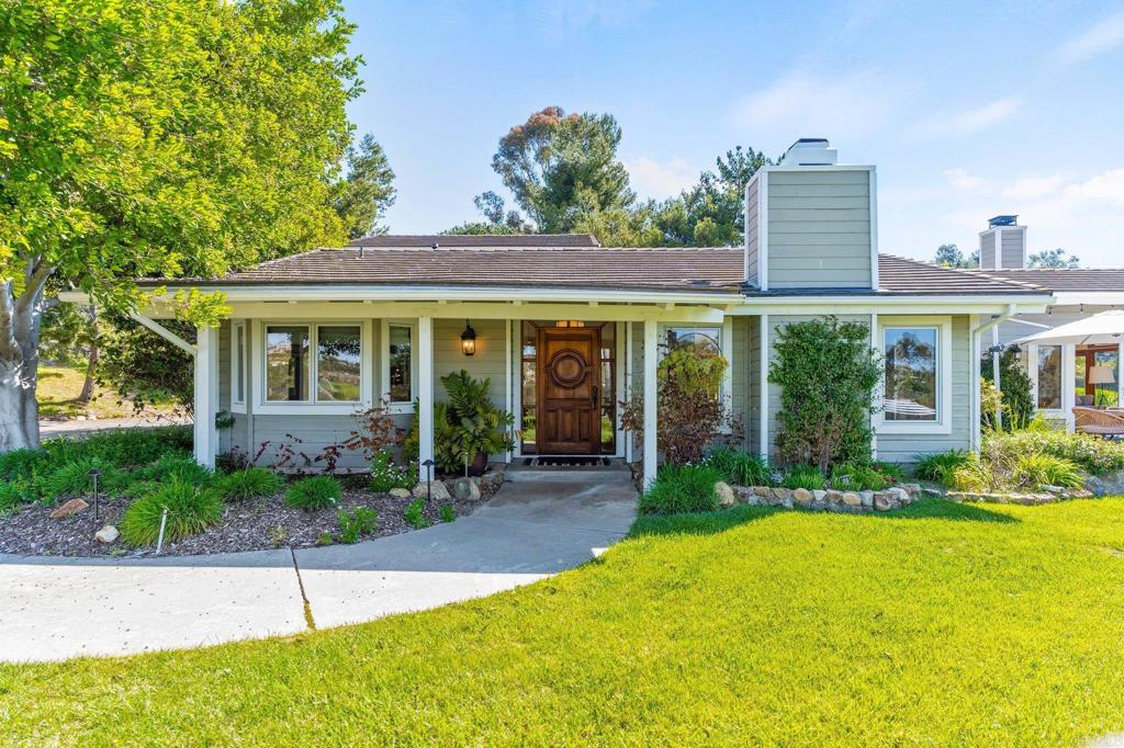 3355 Lone Jack Road Encinitas, CA 92024 - Photo 7 of 54 a view of a house with a yard and plants