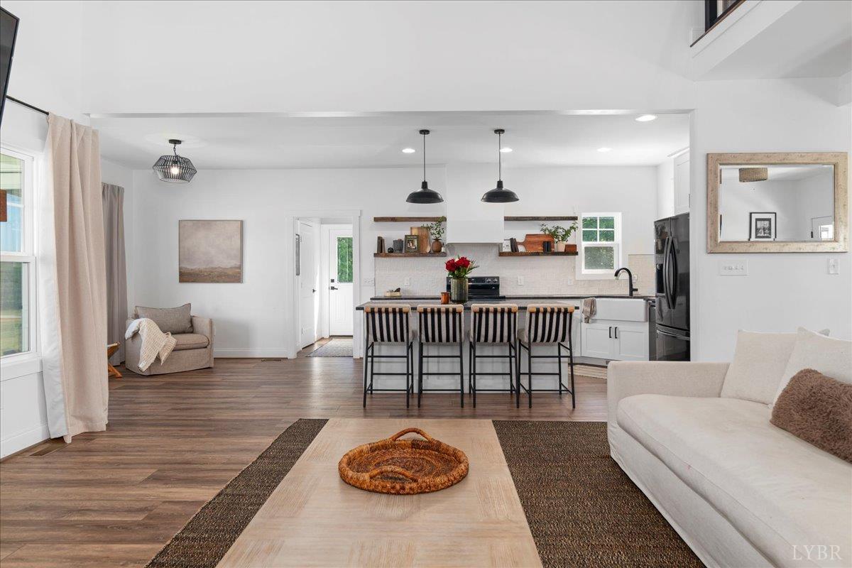 1393 Stonewall Road Concord, VA 24538 - Photo 14 of 85 a living room with furniture and a table