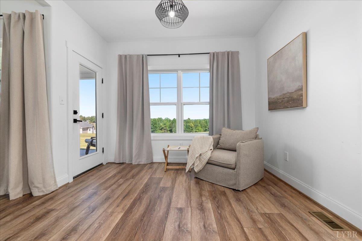 1393 Stonewall Road Concord, VA 24538 - Photo 23 of 85 a living room with furniture and a window