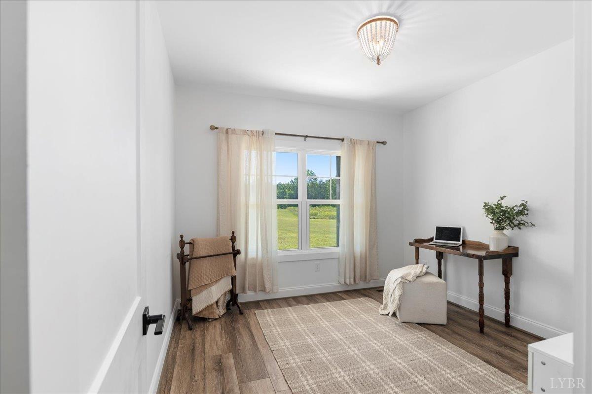 1393 Stonewall Road Concord, VA 24538 - Photo 27 of 85 a living room with a couch and a window
