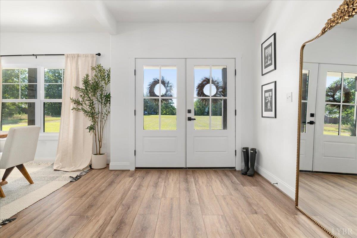 1393 Stonewall Road Concord, VA 24538 - Photo 3 of 85 wooden floor in an empty room with a window