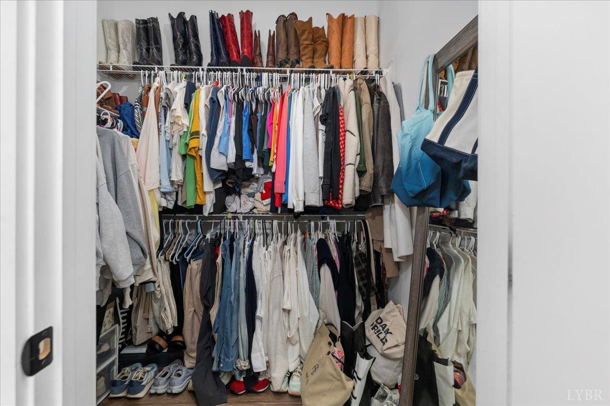 1393 Stonewall Road Concord, VA 24538 - Photo 35 of 85 a view of walk in closet with clothes