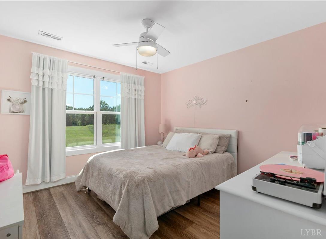 1393 Stonewall Road Concord, VA 24538 - Photo 41 of 85 a bedroom with a bed and a window