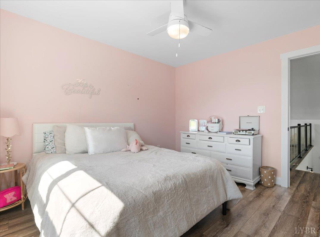 1393 Stonewall Road Concord, VA 24538 - Photo 42 of 85 a bedroom with a bed and a couch