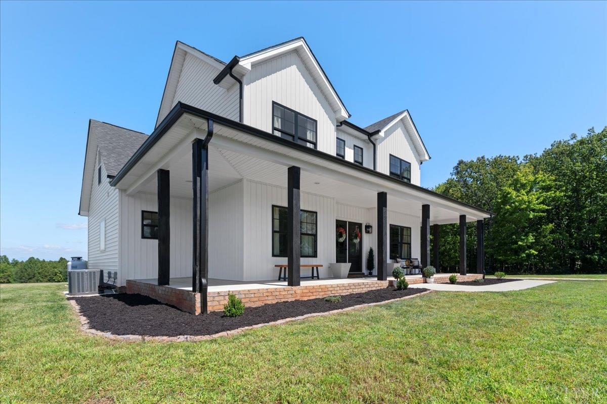 1393 Stonewall Road Concord, VA 24538 - Photo 53 of 85 a view of a house with a yard patio and fire pit