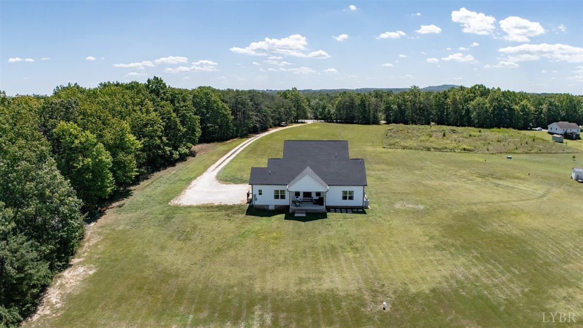 1393 Stonewall Road Concord, VA 24538 - Photo 73 of 85 a view of swimming pool with a yard and large tree