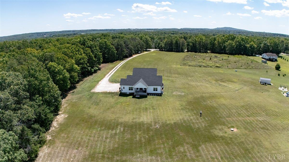 1393 Stonewall Road Concord, VA 24538 - Photo 74 of 85 a view of a garden with a small pool