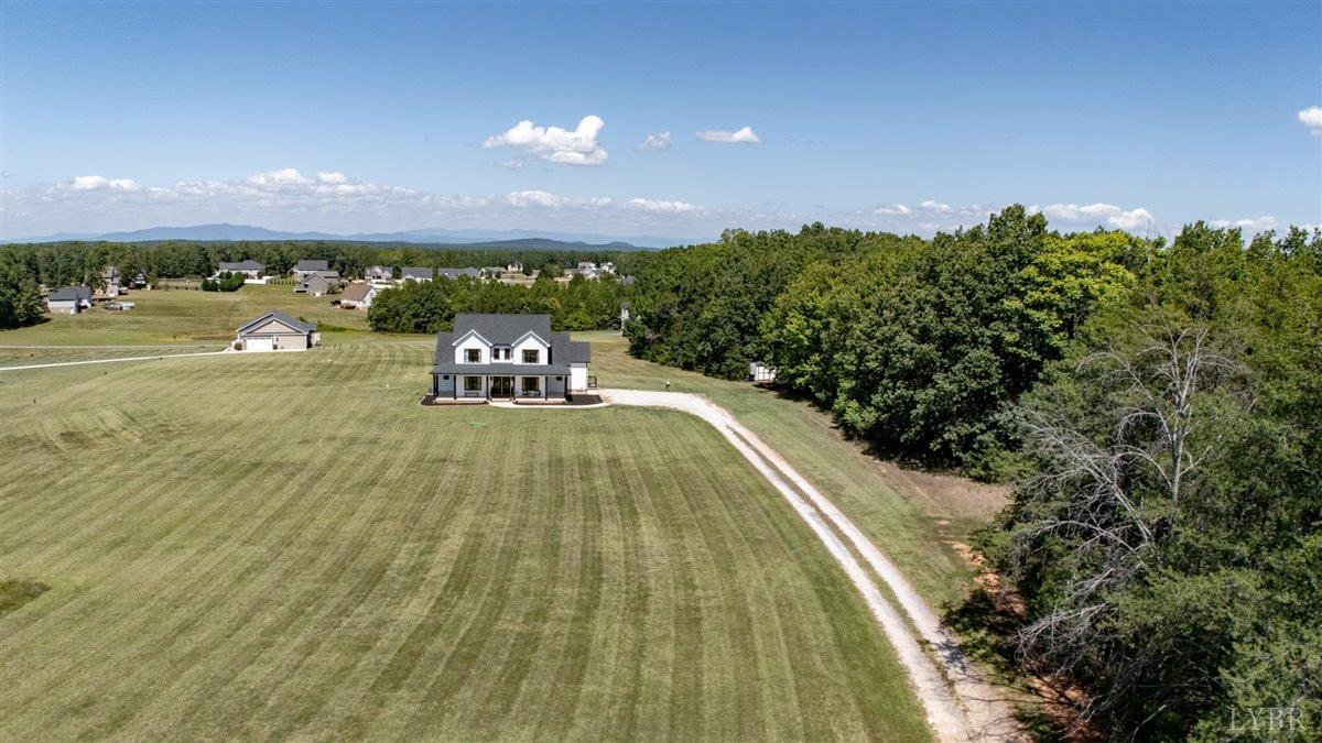 1393 Stonewall Road Concord, VA 24538 - Photo 75 of 85 a view of a swimming pool with an outdoor space and seating area