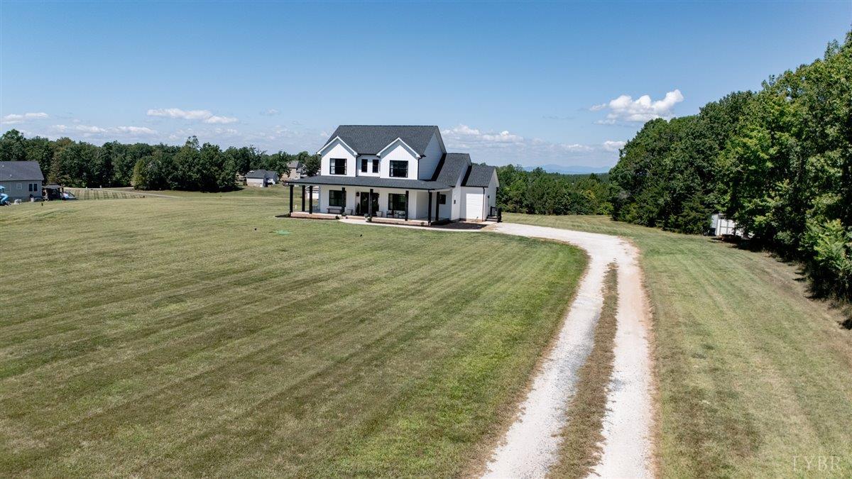 1393 Stonewall Road Concord, VA 24538 - Photo 79 of 85 a view of a house with a yard