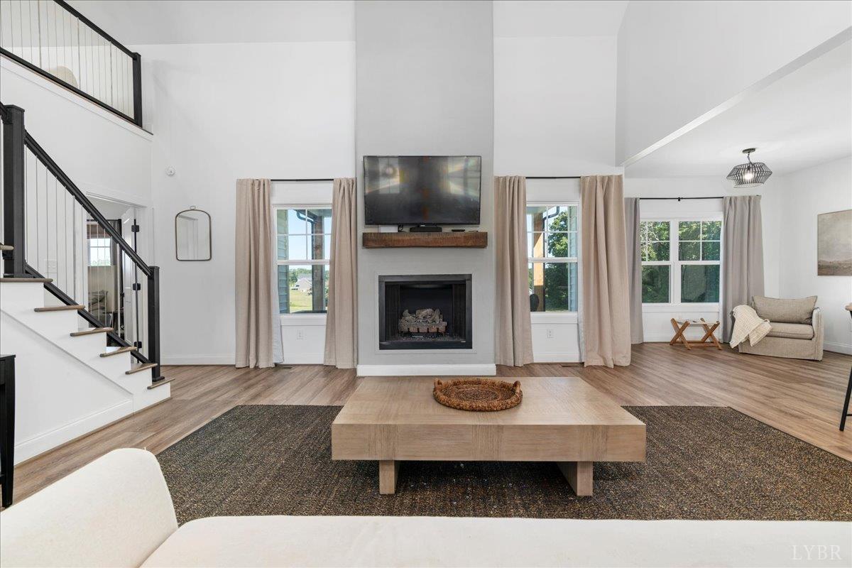 1393 Stonewall Road Concord, VA 24538 - Photo 10 of 85 a living room with furniture and a fireplace