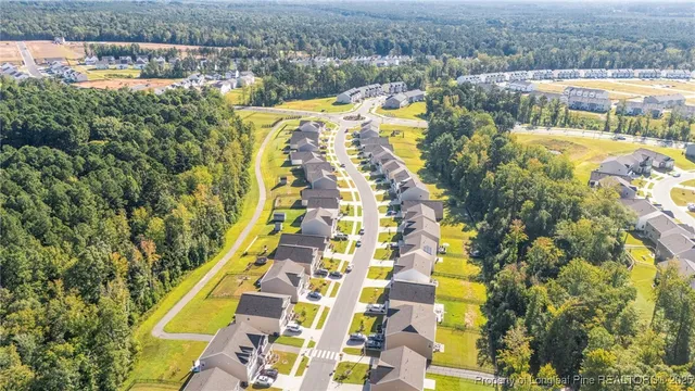 a bathroom with a toilet a sink and a mirror
