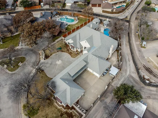 a view of a kitchen with white cabinets