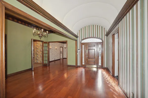 a view of a porch with a floor to ceiling window