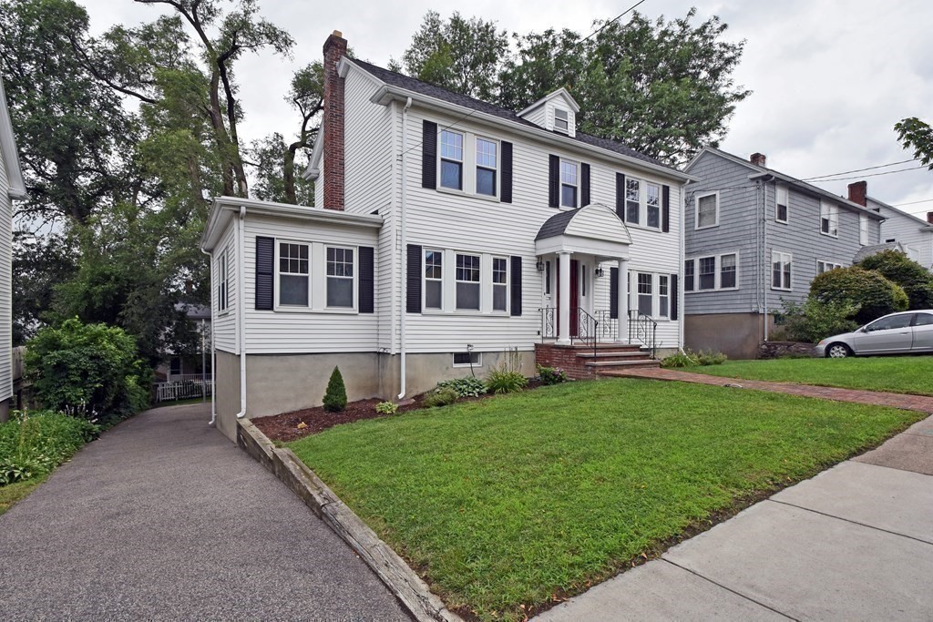 87 Standish Road Watertown, MA 02472 - Photo 24 of 27 front view of a house with a yard