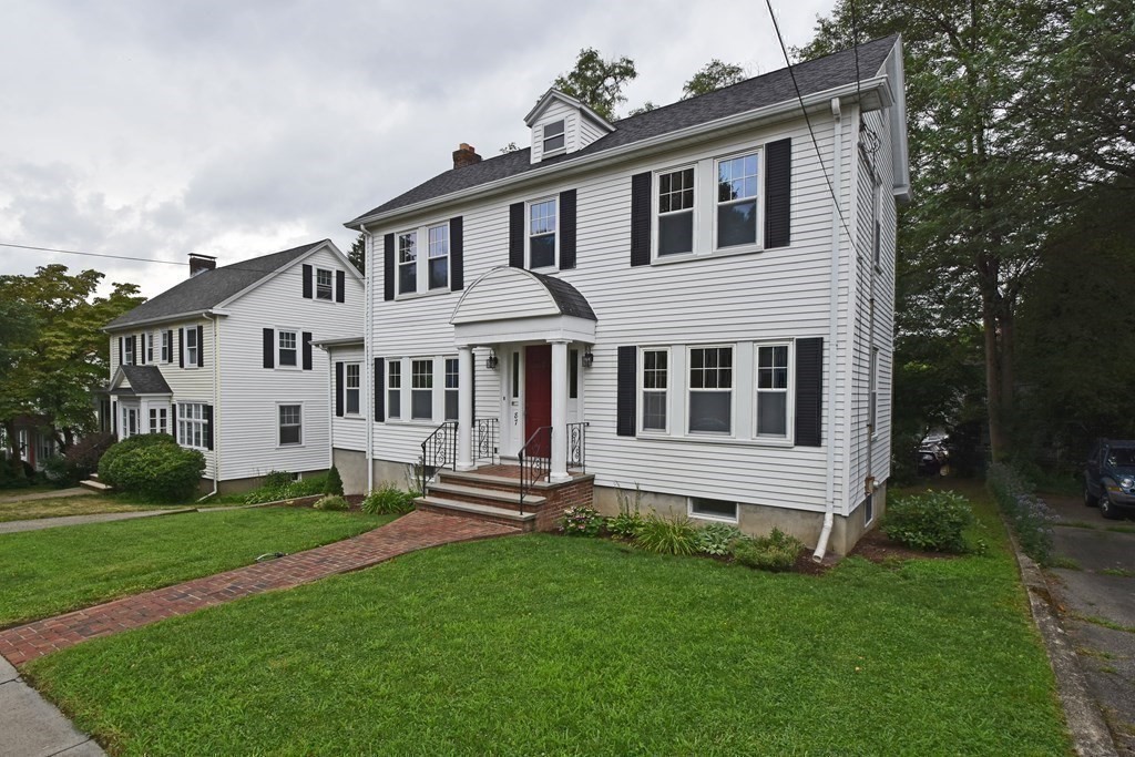 87 Standish Road Watertown, MA 02472 - Photo 25 of 27 a front view of a house with a yard