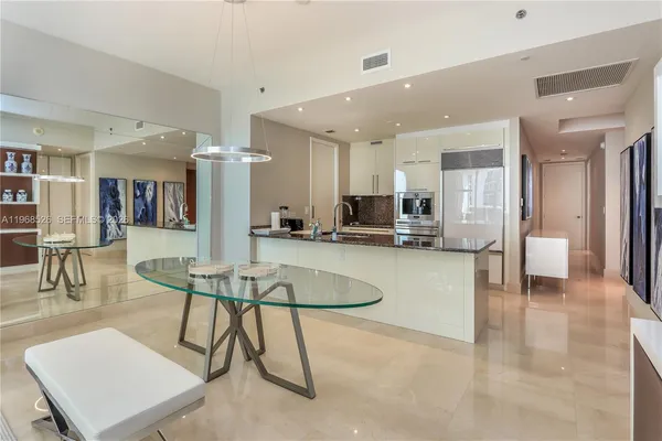 a view of living room with furniture and window