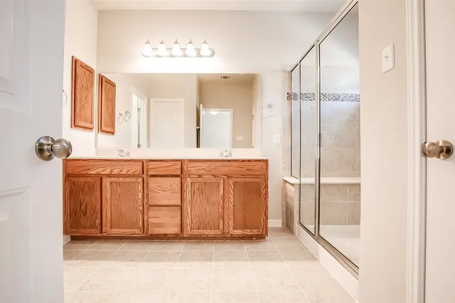 an empty room with a bathroom